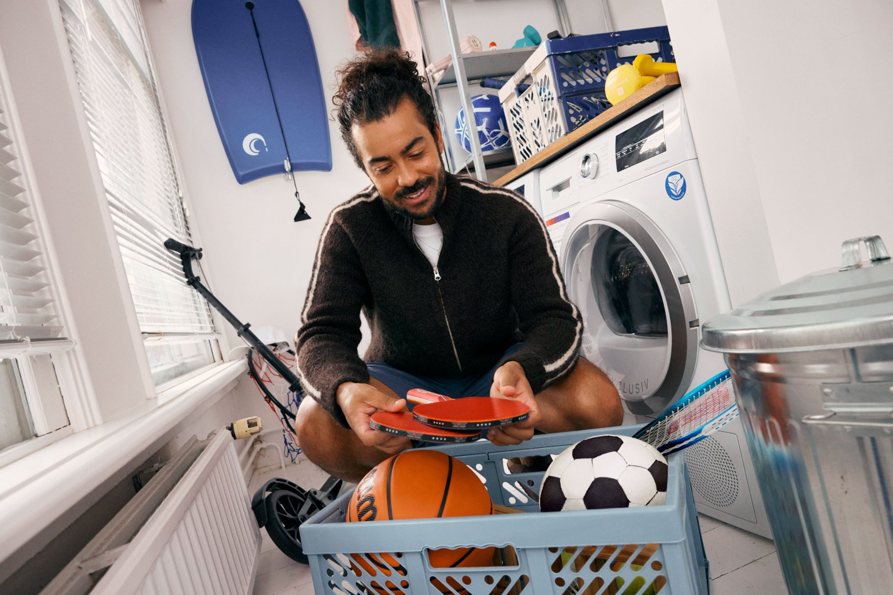 Sports gear in laundry room